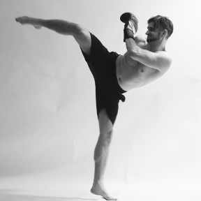 muay thai fitness instructor high kick
